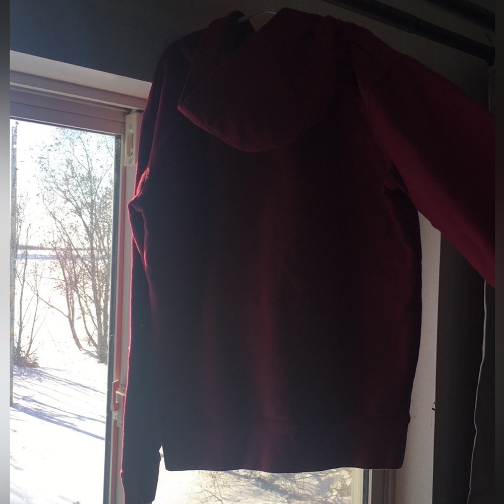 Two hoodies from cabbalas one bass pro shop and other is cabbalas store